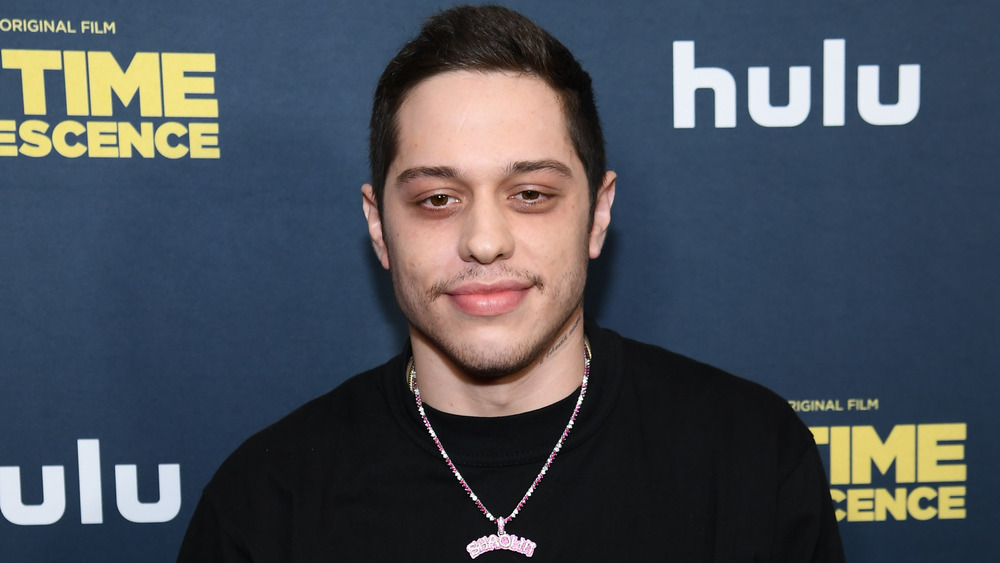 Pete Davidson smirking 