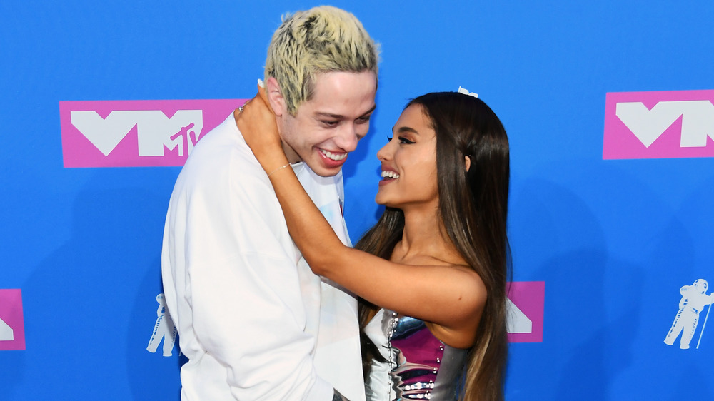 Pete Davidson and Ariana Grande almost kissing on the VMAs red carpet