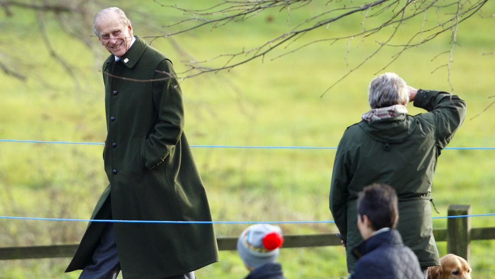 Prince Philip smiling at onlookers at Sandringham