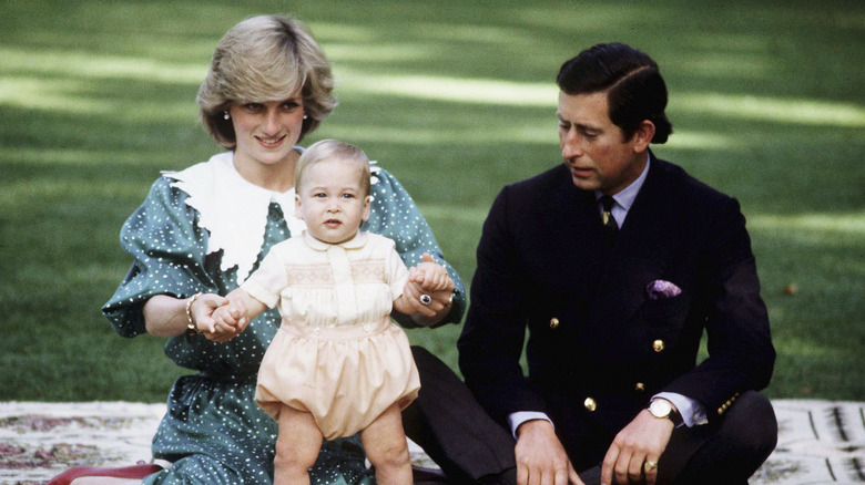 Princess Diana, Prince William, and Prince Charles outside