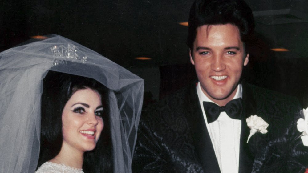 Priscilla Presley, Elvis Presley on their wedding day