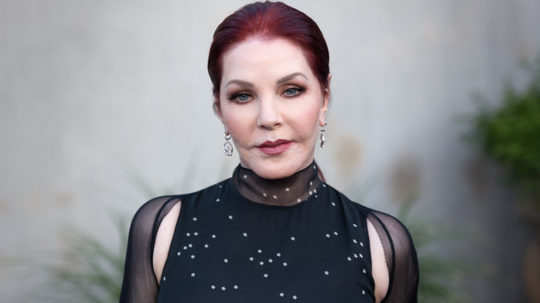 Priscilla Presley in black evening gown