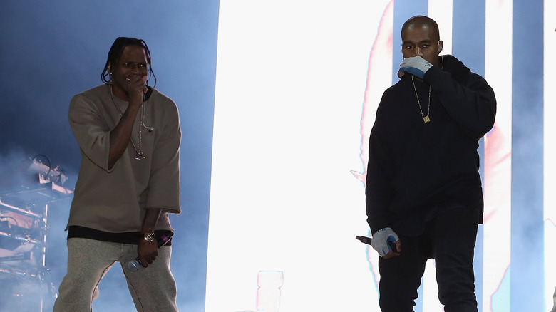 Pusha T and Kanye West on stage, performing