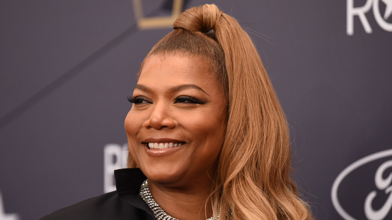 Queen Latifah wearing a high ponytail