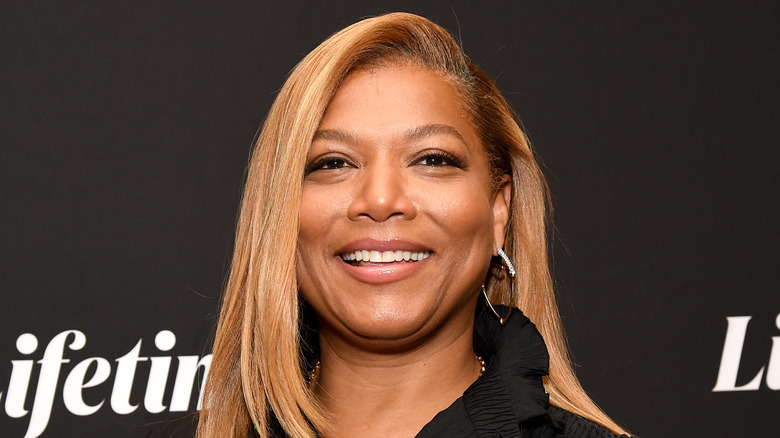 Queen Latifah wearing a black shirt