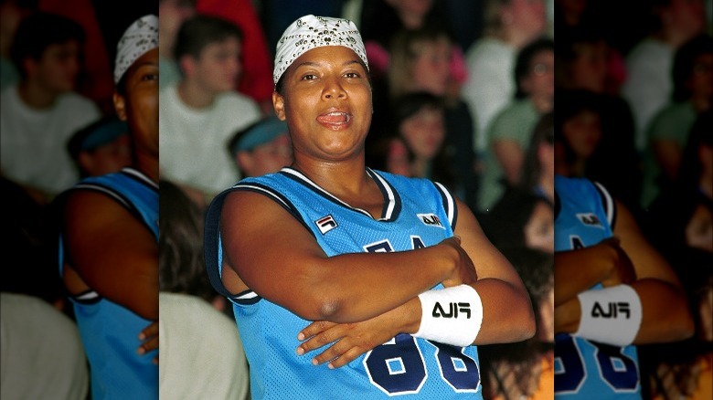 Queen Latifah in a basketball jersey