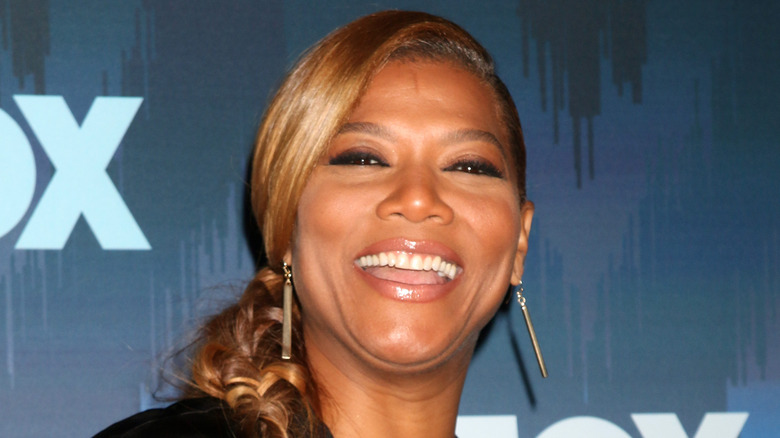 Queen Latifah with a big smile