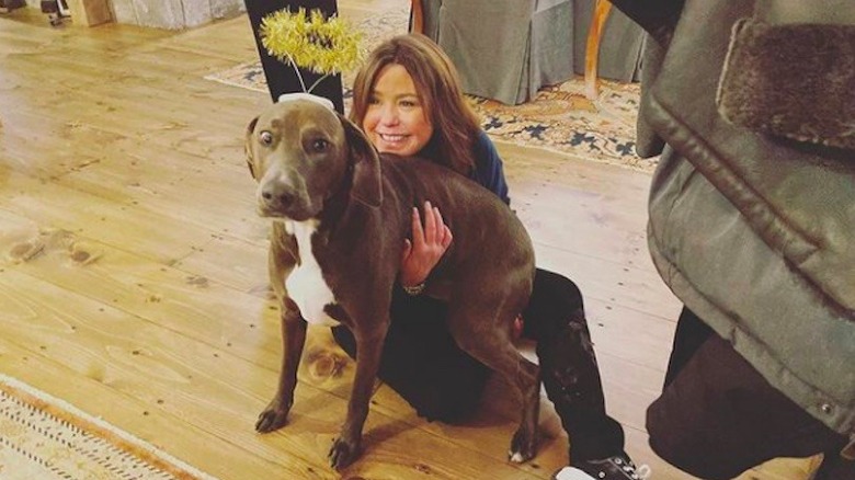 Rachael Ray posing with her pit bull