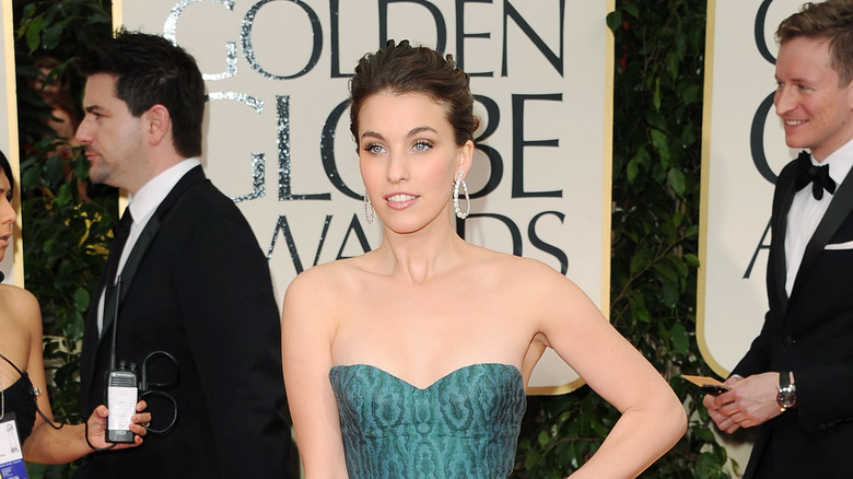 Rainey Qualley posing at Golden Globes