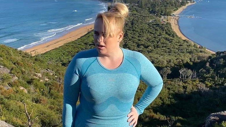 Rebel Wilson on a mountain 