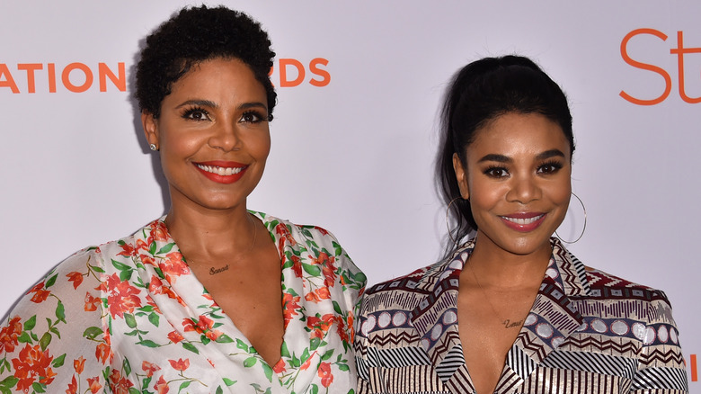 Sanaa Lathan and Regina Hall smiling