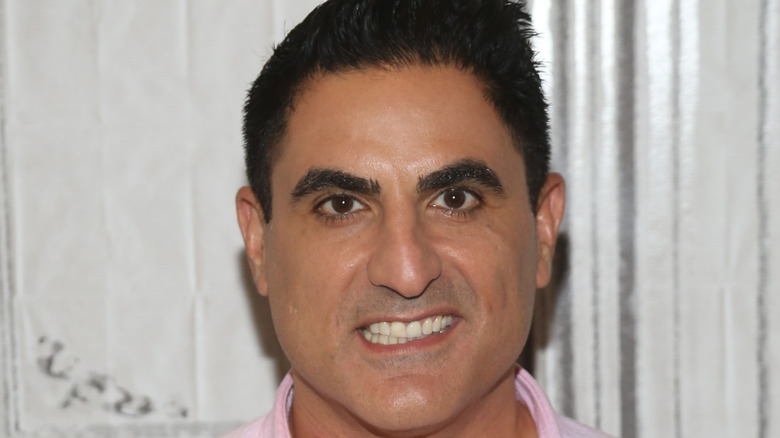 Reza Farahan posing for cameras