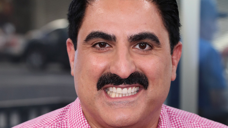 Reza Farahan posing for cameras