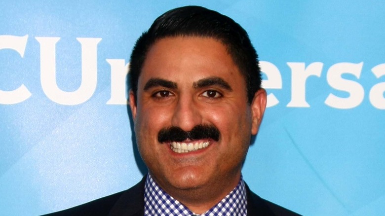 Reza Farahan posing for cameras