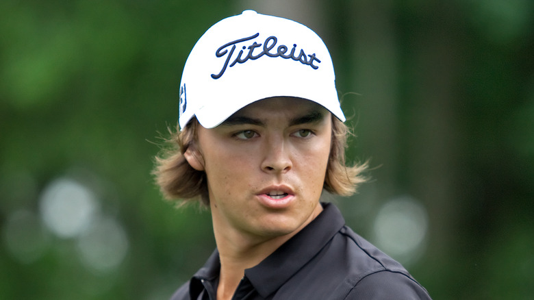 Rickie Fowler looking away, speaking