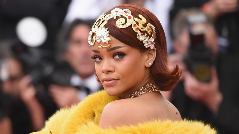 Rihanna wearing yellow fur