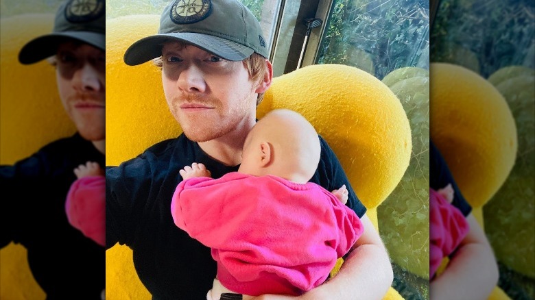 Rupert Grint with his daughter Wednesday