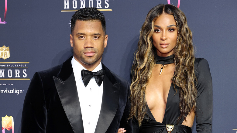 Russell Wilson and Ciara posing