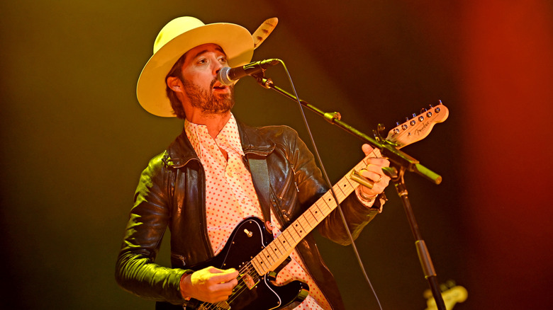 Ryan Bingham playing electric guitar