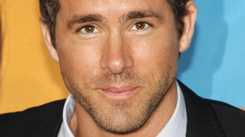 Ryan Reynolds deeply staring