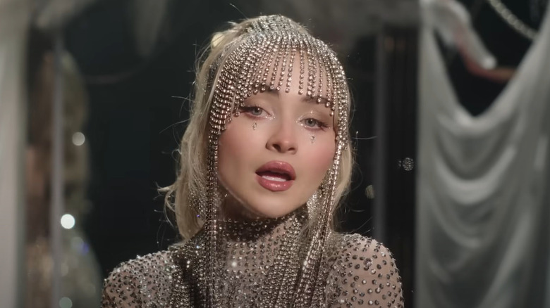 Sabrina Carpenter wearing a crystal headpiece