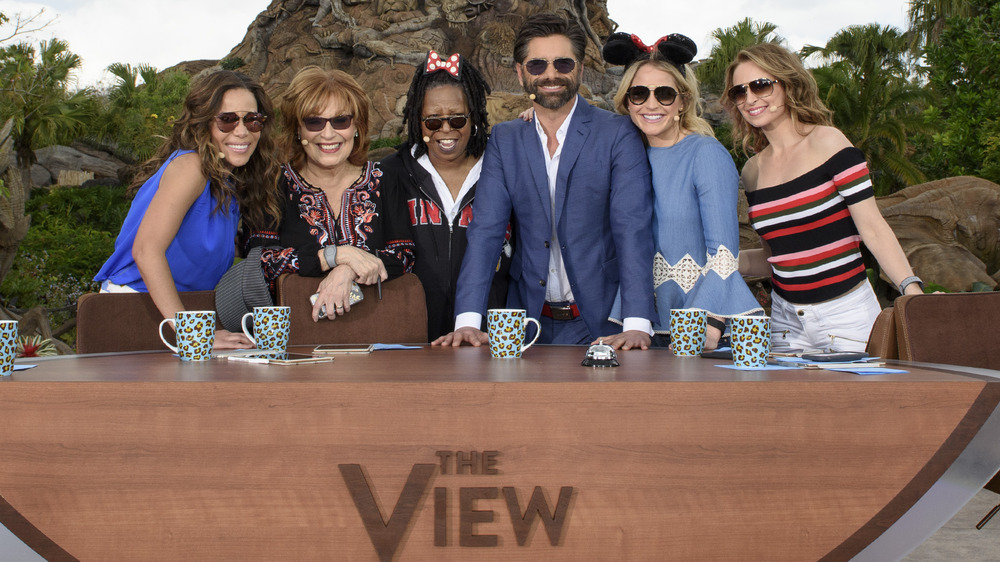 The View co-hosts posing with John Stamos