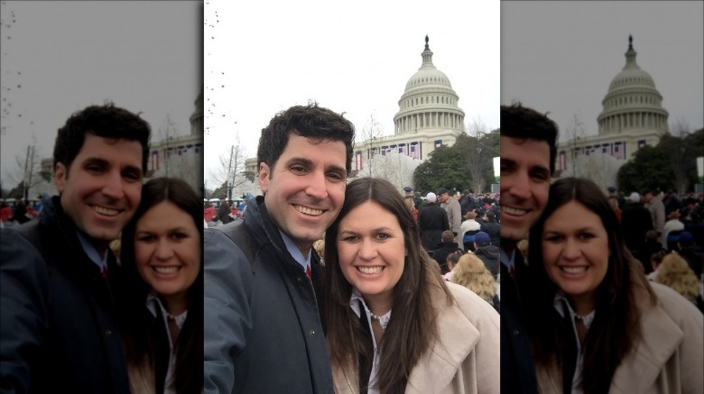 Bryan Sanders at a political event with wife Sarah Huckabee Sanders