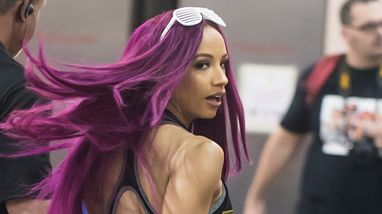 Sasha Banks looking over shoulder