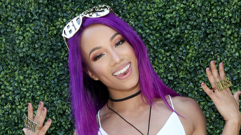 Sasha Banks showing off bling