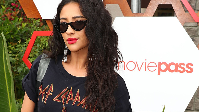 Shay Mitchell sunglasses and red lipstick