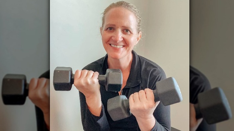 Christine Brown lifting weights