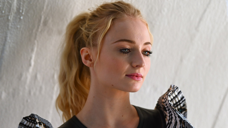 Sophie Turner looking off