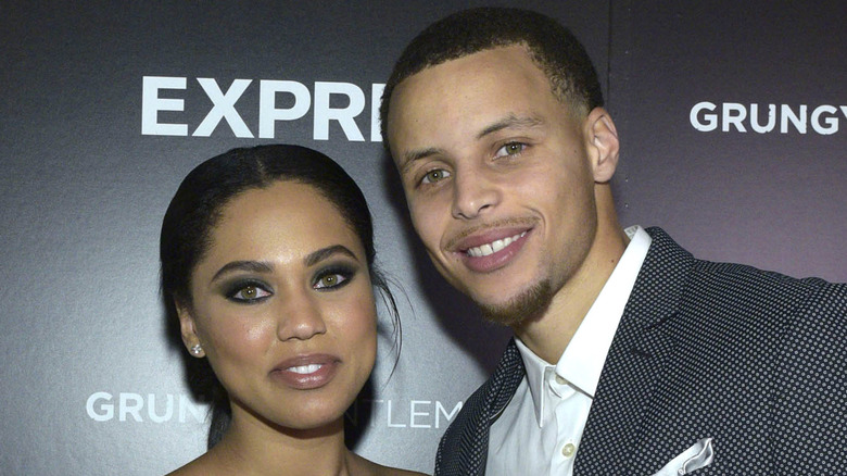 Ayesha Curry, Steph Curry at an event, smiling