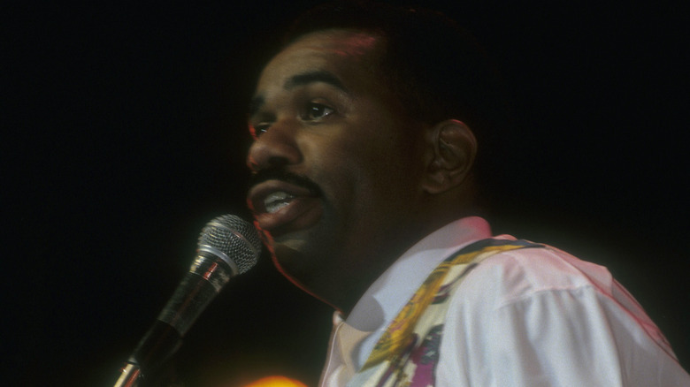 Steve Harvey performing standup in the early 1990s