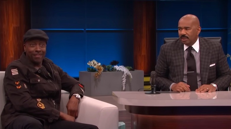Arsenio Hall sitting as a guest on Steve Harvey's show