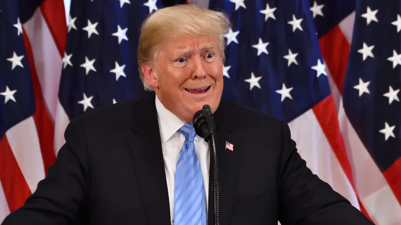 Donald Trump strange face American flag