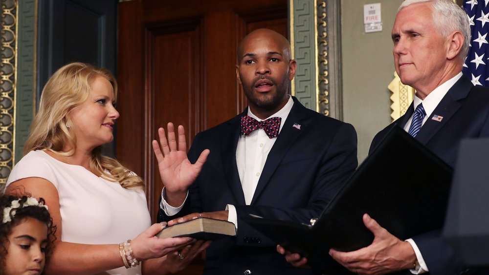 Mike Pence, Jerome Adams, wife Lacey Adams and daughter, Millie