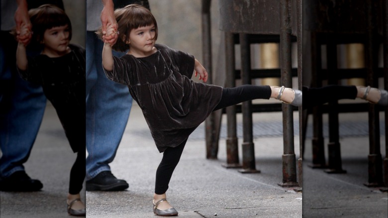 Suri kicking leg out