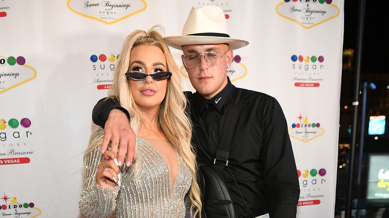 Tana Mongeau and Jake Paul posing together