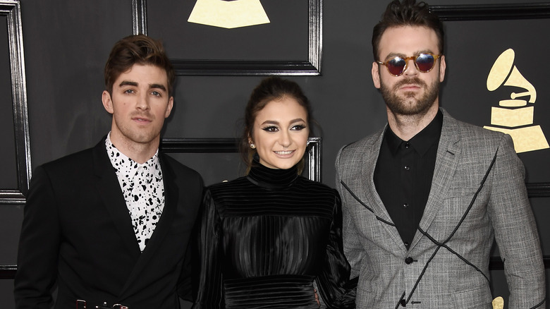 Andrew Tagger, Daya, and Alex Pall smiling 