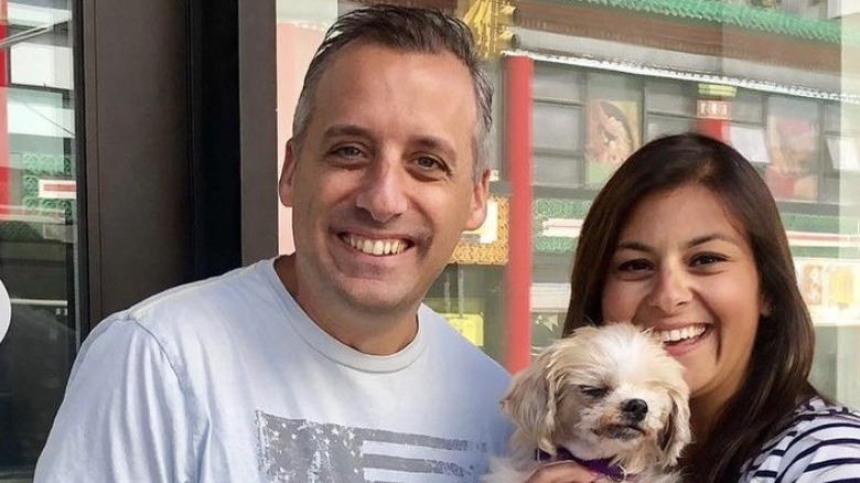 Joe Gatto and Bessy Gatto holding one of their dogs