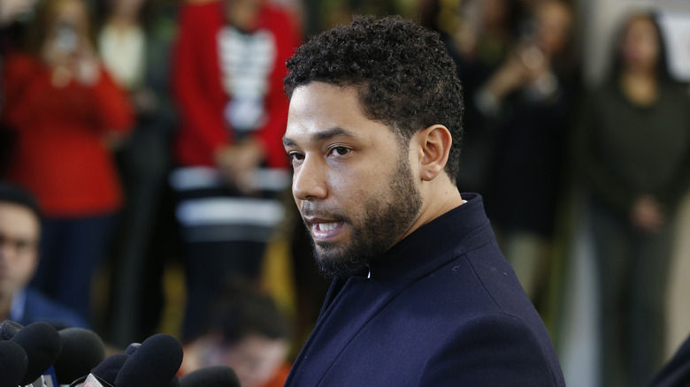 Jussie Smollett talks to press outside court