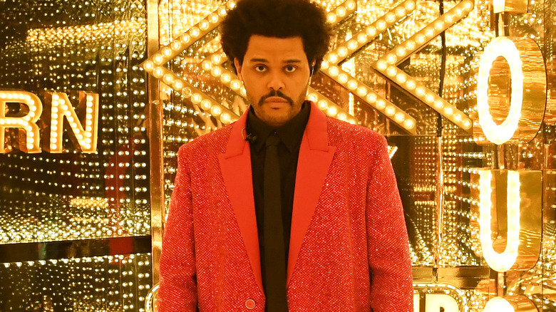 The Weeknd posing light mirrors