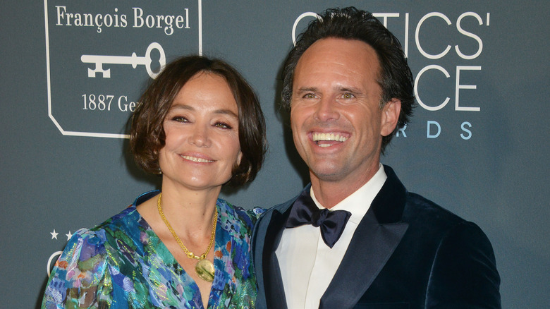 Walton Goggins posing and smiling with wife Nadia Conners at the Critics' Choice Awards in 2020