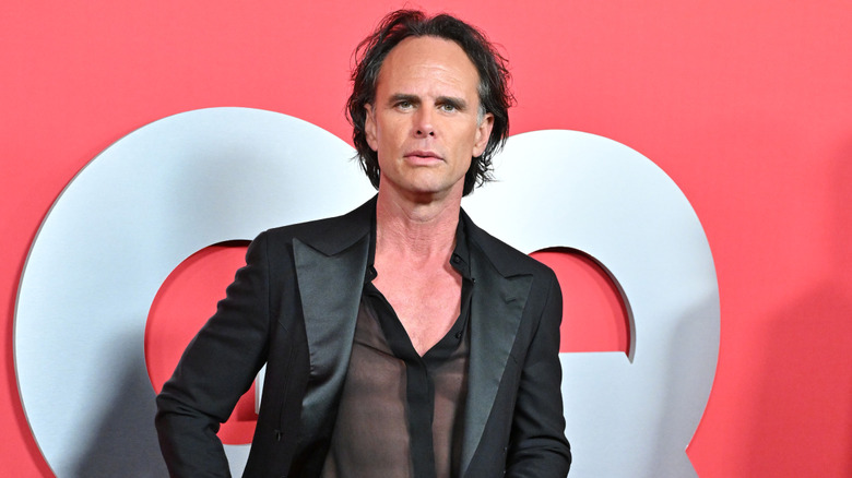 Walton Goggins posing at a GQ event