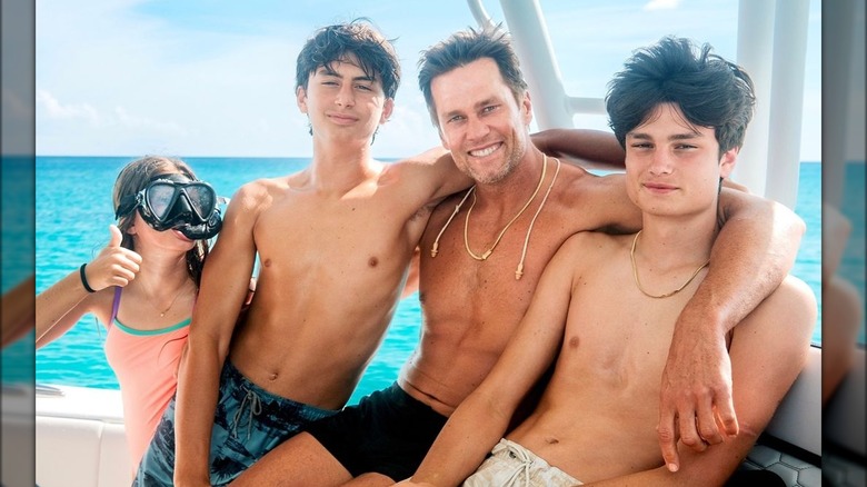 Tom Brady with his kids Vivian, Ben, and Jack on a boat