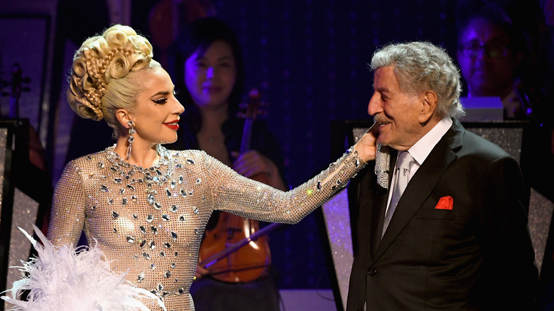 Lady Gaga touching Tony Bennett's face