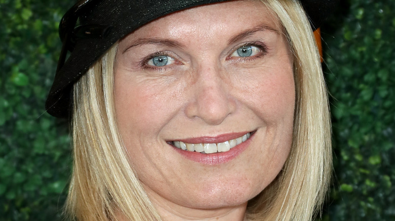 Tosca Musk wearing black hat