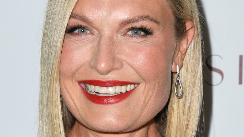 Tosca Musk in red lipstick