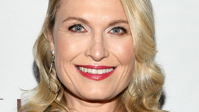 Tosca Musk in red lipstick